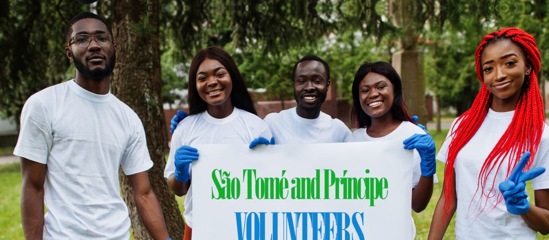 group of volunteers holding a banner