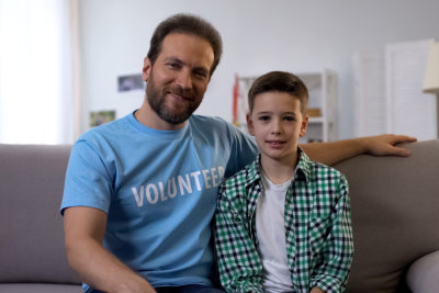 A volunteer looking out for a child