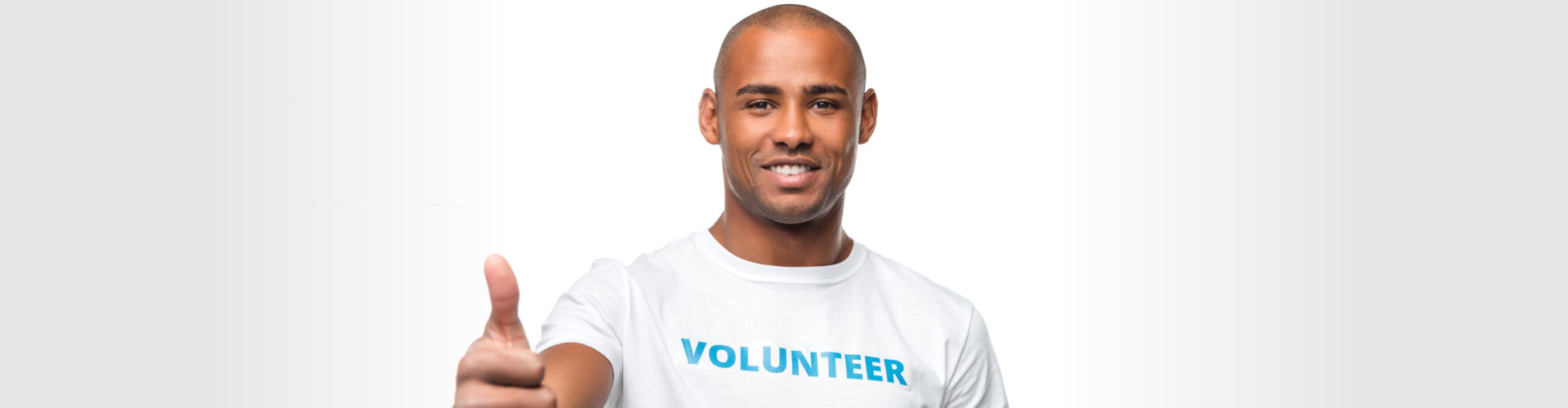 a volunteer smiling